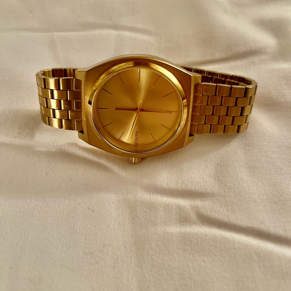 Gold Nixon time teller (will not sell for less than listed)